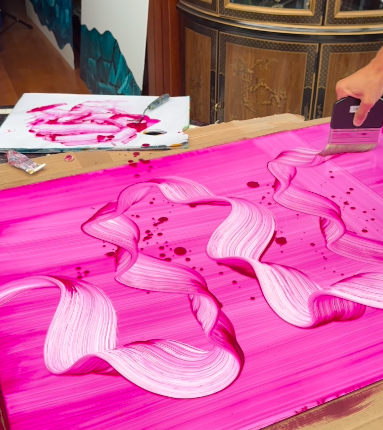 Abstract painting inspired by movement, featuring dynamic pink brushstrokes and flowing gestures on an aluminium panel