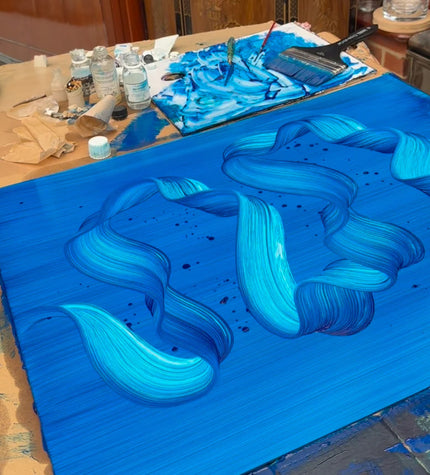 Abstract blue wave painting inspired by the sea, featuring fluid brushstrokes and ocean-inspired texture