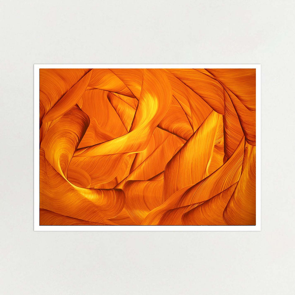 Limited edition abstract art print featuring a swirling, layered pattern of warm orange and yellow tones, presented with a white border on a light background.